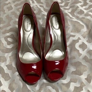 Red peep toe shoes